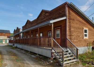 row of wooden cabins